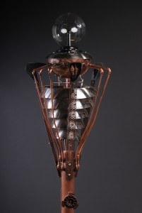 Insect Light sculpture against dark background in the daylight